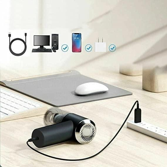 “2-in-1 mini vacuum and air blower for electronics”